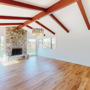 Living room remodeling vaulted ceiling and beams apparents