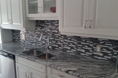 Example of a trendy kitchen design in Toronto