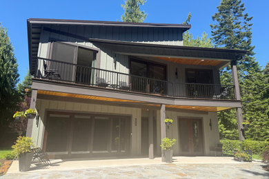 Example of a mid-sized trendy detached garage workshop design in Seattle