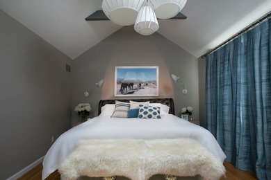 Inspiration for a mid-sized modern guest carpeted bedroom remodel in New York with gray walls