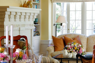 Mid-sized elegant dark wood floor enclosed dining room photo in Other with a standard fireplace and a brick fireplace