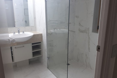 Inspiration for a contemporary bathroom in Sunshine Coast with an open shower, terrazzo floors and an open shower.