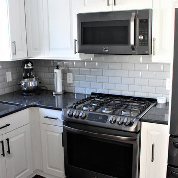 Showplace EVO Kitchen in Sierra Extra White w/ Slab Drawer Headers