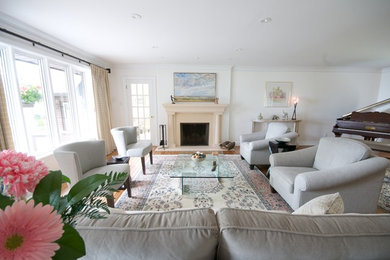 Living room - large transitional open concept medium tone wood floor living room idea in Toronto with a standard fireplace, a stone fireplace and beige walls