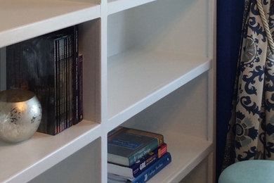 Mid-sized transitional freestanding desk carpeted study room photo in Other with blue walls