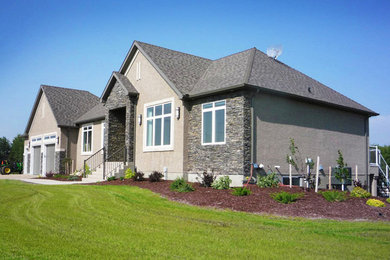 Example of a mid-sized minimalist beige two-story house exterior design in Phoenix