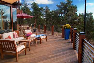Mid-sized country backyard deck in Denver with no cover.