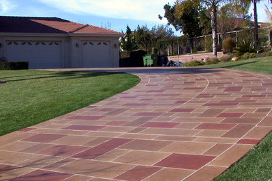 Design ideas for a large traditional partial sun front yard concrete paver driveway in San Francisco.