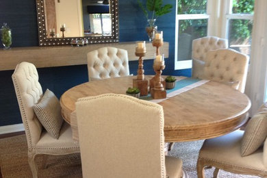 Dining room - small transitional dark wood floor dining room idea in Los Angeles with blue walls