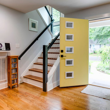 Bright Midcentury Entry Remodel with Yellow Door and Cable Railing