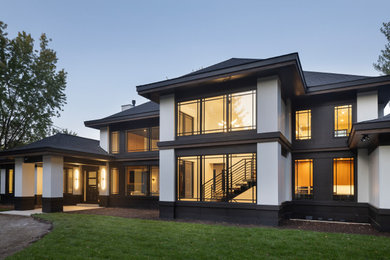Inspiration for an asian two-story house exterior remodel in Minneapolis