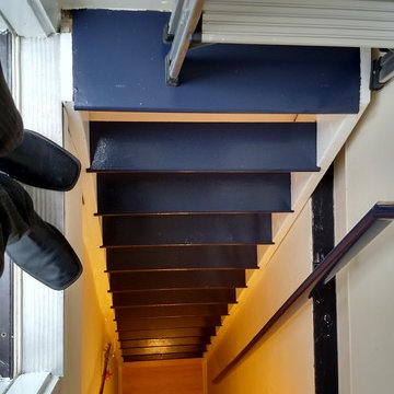 Storage ships ladder in a brownstone walk-up