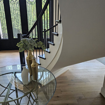 Project #130 | Curved Staircase with Wraparound Balcony