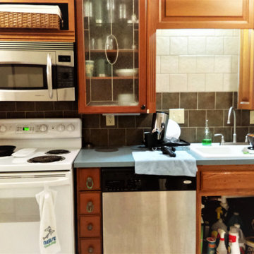 Before - Kitchen with mismatched cabinets