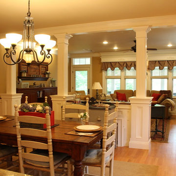 Open concept kitchen and family room with square columns to add some separation