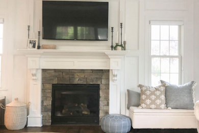 Example of a transitional living room design in New York