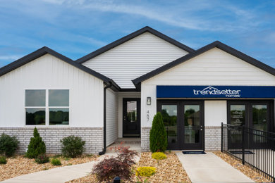 Example of a country exterior home design in Other