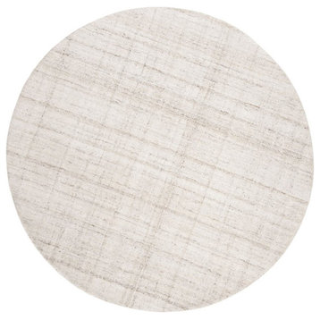 Safavieh Abstract 6' Round Hand Tufted Rug in Ivory and Beige