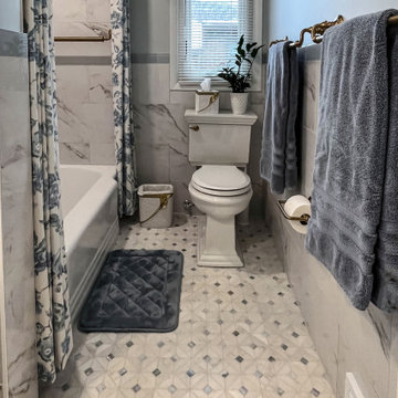 Blue and White Guest Bathroom with Gold Accents