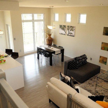 Contemporary show home with orange accessories.
