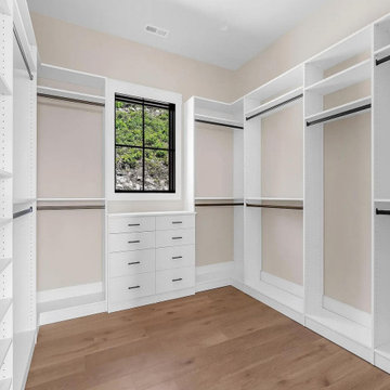 primary Closet with Hang-space and a Built-in Countertop