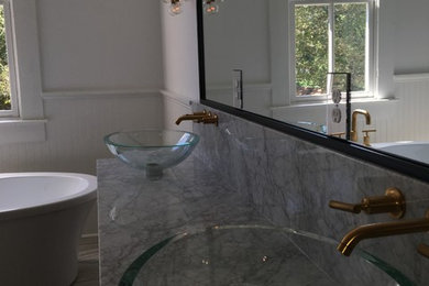 Example of a bathroom design in Other with a vessel sink