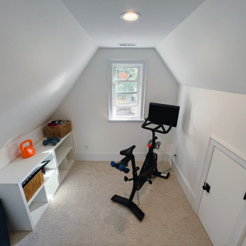 Cozy Attic Home Gym with Sloped Ceiling