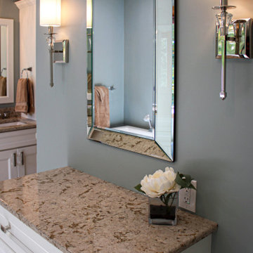 White Master Bathroom with Freestand Tub and Corian Solid Surface Shower