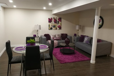 Basement - mid-sized transitional underground dark wood floor and brown floor basement idea in Toronto with beige walls