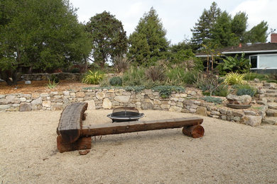 Large mediterranean backyard full sun outdoor sport court in San Francisco with gravel for spring.