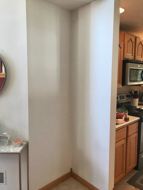 how to decorate an awkward wall space?