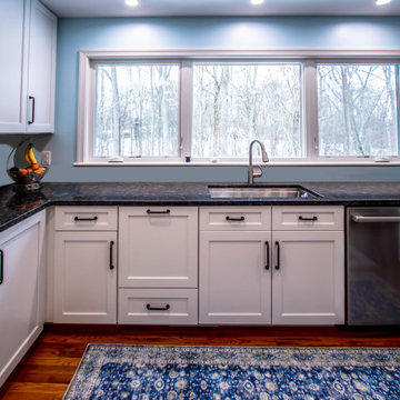 Kitchen with White Perimeter and Blue Island Cabinet Reface