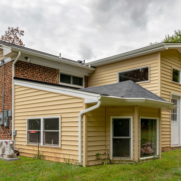 Cheerful Multi Level Rear Addition to Expand Kitchen, Mudroom & Sunroom in Oakt