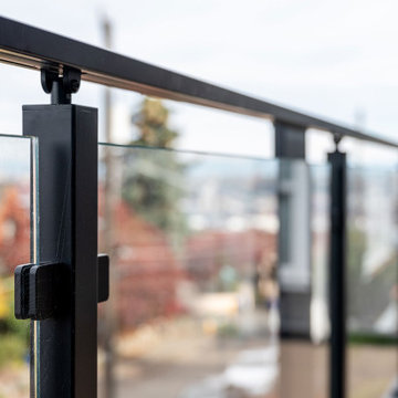 West Seattle Modern Glass Deck Railing & Black Frame Detail