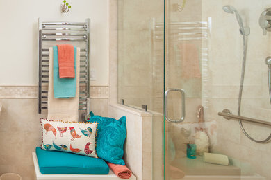 Small elegant master beige tile and porcelain tile porcelain tile and beige floor alcove shower photo in San Diego with shaker cabinets, white cabinets, a two-piece toilet, beige walls, an undermount sink, quartz countertops and a hinged shower door
