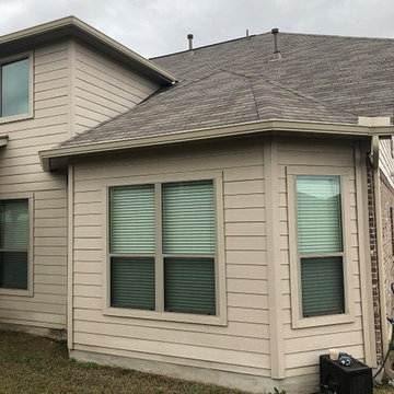Buda, TX Seamless Gutter Install, Beige Split Level Home