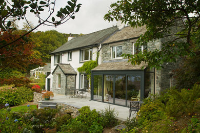 Contemporary house exterior in Other.