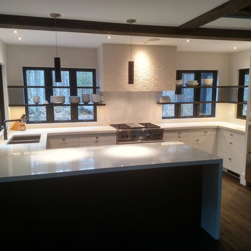 Jackson NH Modern High Gloss Kitchen with Quartz Waterfall Penninsula