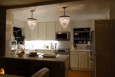 Design ideas for a kitchen in San Francisco with quartz benchtops and medium hardwood floors.