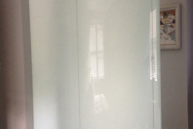 Bespoke frameless opaque cylindrical shower enclosure