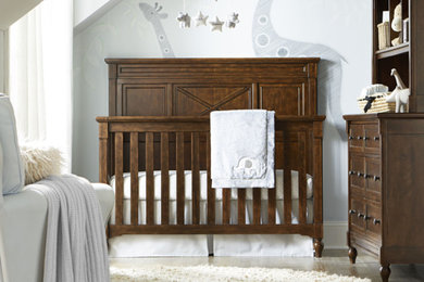 Mid-sized elegant gender-neutral nursery photo in San Luis Obispo with blue walls