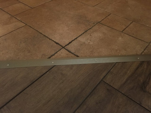 Transition Options Tile To Laminate, How To Install Transition Strip Between Laminate And Tile