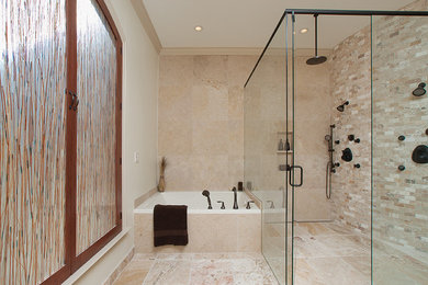 Bathroom - huge transitional master beige tile and stone tile travertine floor bathroom idea in Atlanta with an undermount sink, recessed-panel cabinets, medium tone wood cabinets, marble countertops, a two-piece toilet and beige walls