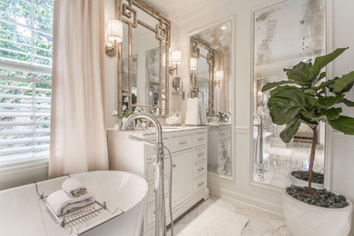 Large elegant master beige tile and marble tile marble floor and gray floor bathroom photo in Little Rock with recessed-panel cabinets, white cabinets, gray walls, an undermount sink, granite countertops, a hinged shower door and gray countertops