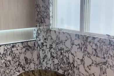 Bathroom - mid-sized modern master beige tile and porcelain tile porcelain tile, beige floor and double-sink bathroom idea in New York with open cabinets, dark wood cabinets, a one-piece toilet, a console sink, marble countertops, black countertops, a niche and a floating vanity