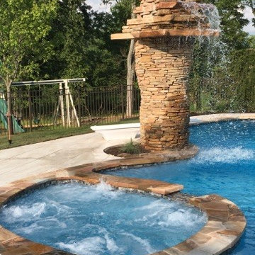 Beach Entry Pool with Cascading Water Feature & Slide