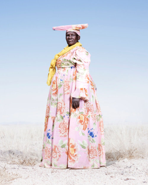 Hang one or two pictures above my sofa?