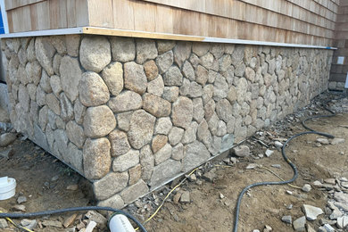 Example of a beach style exterior home design in Boston