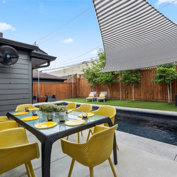 Covered outdoor dining with bold accent seating