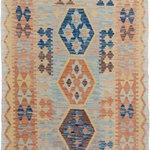 Bareens Designer Rugs - Retro Turkish Kilim Heath Hand-Woven Wool Rug - 3'4'' x 5'5'' - Elevate the elegance of your home with this stunning hand-woven tribal Kilim wool rug. Meticulously crafted on a loom by the Nomad Turkman people using hand-spun wool and 100% natural vegetable dyes, these rugs are recognized for their repetitive geometric patterns, incorporating naturalistic floral and traditional designs. The contemporary fashion palette results in bold, sharp patterns that are incredibly versatile, as the pattern is the same on both sides. These reversible rugs feature a lighter shade on one side and brighter colors on the other, providing versatility according to preference. These unique rugs are made by knotting short strands of different colors onto the warps and securing them by tightly pressing the wefts. The designs are created by interweaving the various colored wefts and warps. Kilims are known for their exceptional durability and versatility, making them truly unique rugs.  Product Details    Rug Size: 3'4'' x 5'5''  Material: 100% Wool  Style: Kilim, Flat Weave, Dhurrie, Turkish, Southwestern, Rustic, Tribal  Colors: Grey, Blue, Rust, Brown  Weave Type: Hand-Woven, Handmade  Pile Height: Less than 0.25 inch